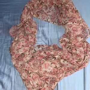 It’s a floral sheer scarf.
